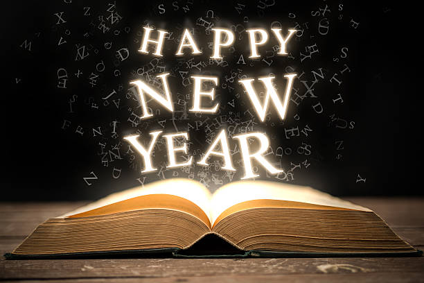 Open Book with Happy New Year 2025